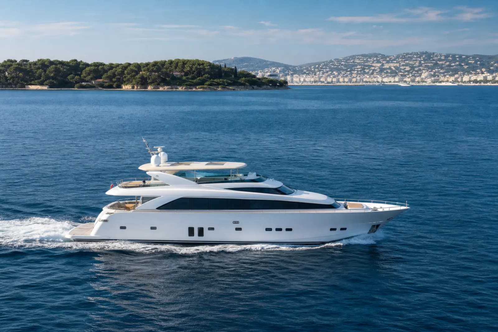 Bahamas mega yacht charter with a luxury yacht near clear shallow water