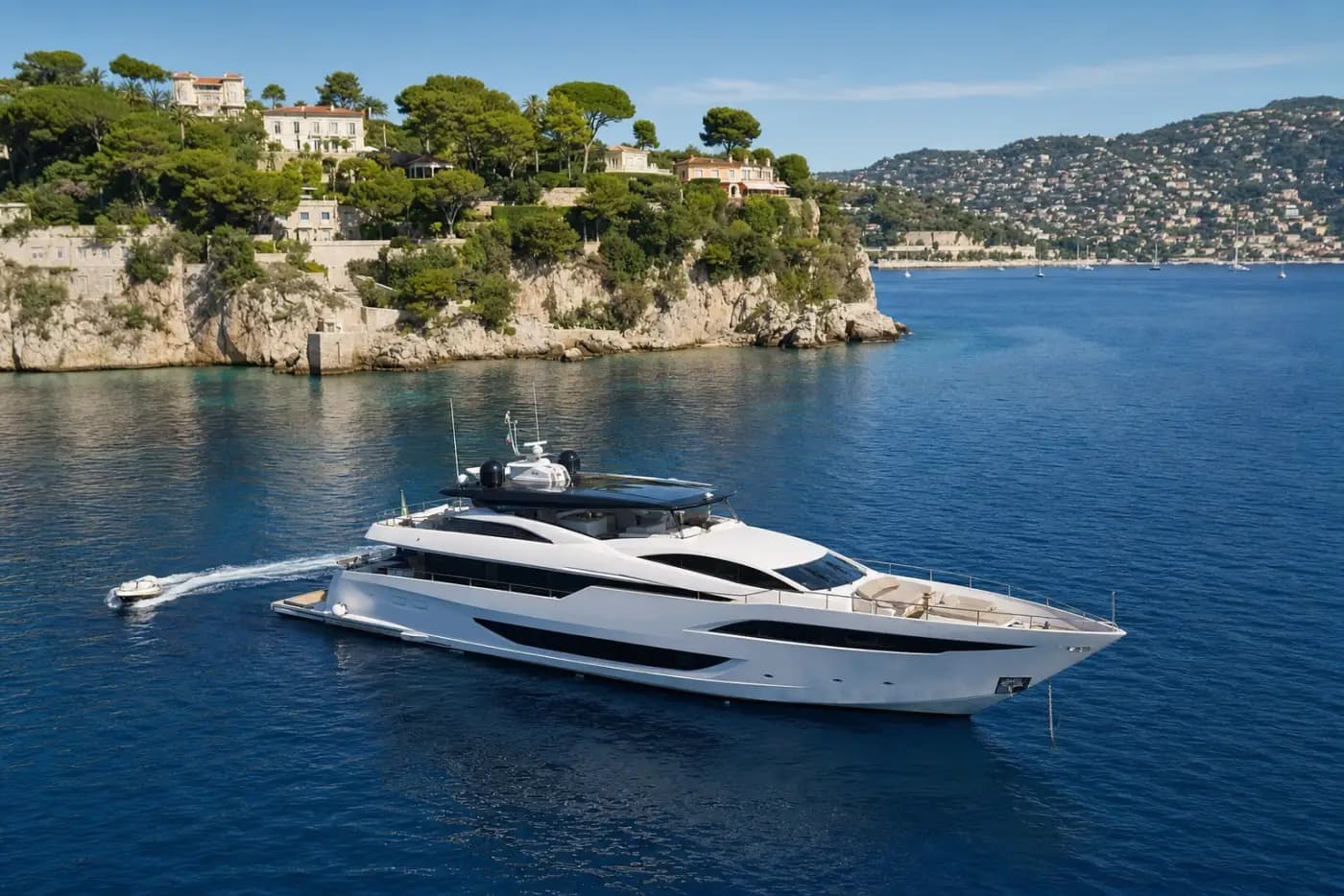 Caribbean superyacht charter with a luxury yacht at anchor in clear water