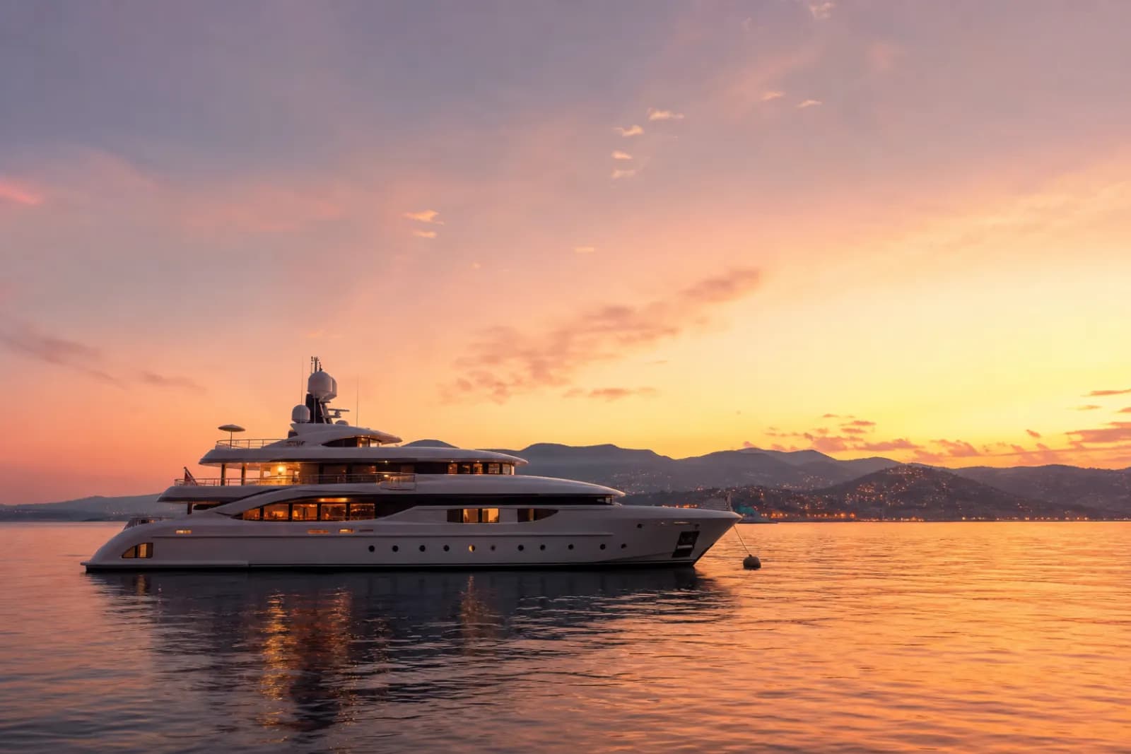 Superyacht charter at sunset
